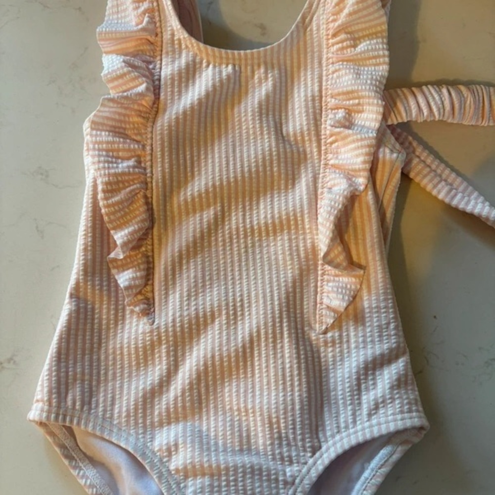 Peach Ruffle-Trim Ribbed Girls One-Piece Bodysuit